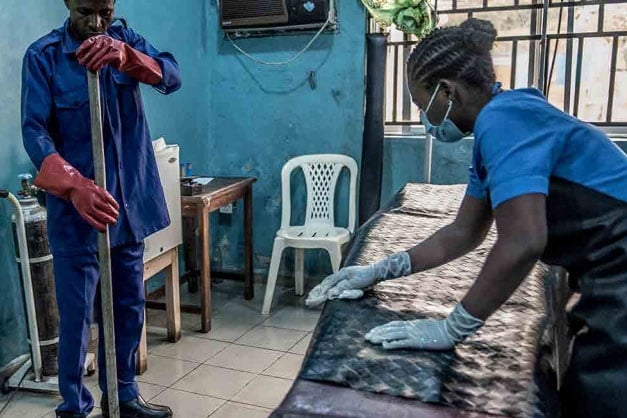 Staff cleaning health care facilities